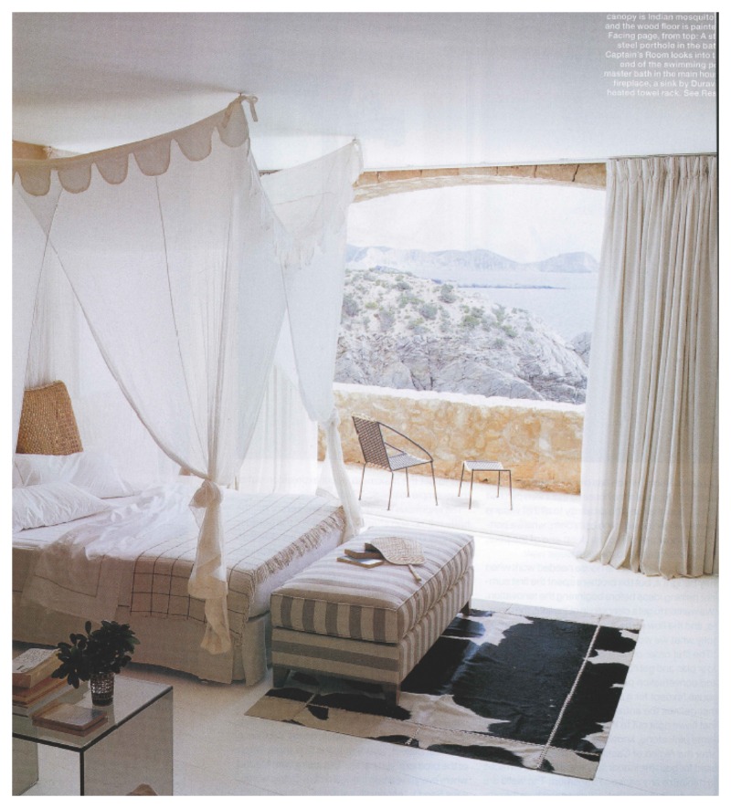Nomad Luxuries an inspirational photo of a whimsical and simple Idyllic bedroom with a monochromatic color scheme. 