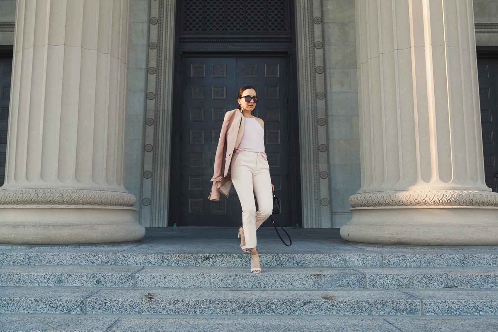 Yana Puaca of NoMad Luxuries wearing a pink suit from zara and loft and ann taylor Chicago for the Fall