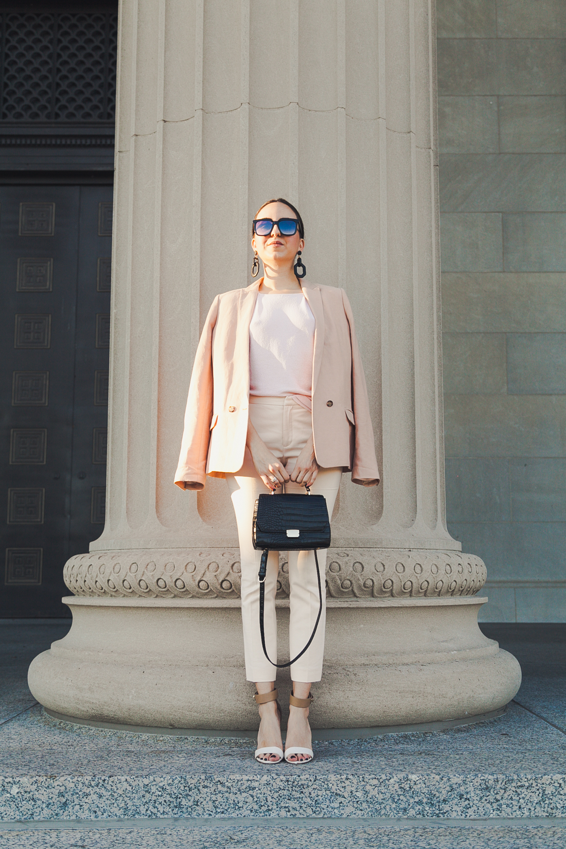 Yana Puaca of NoMad Luxuries wearing a pink suit from zara and loft and ann taylor Chicago for the Fall