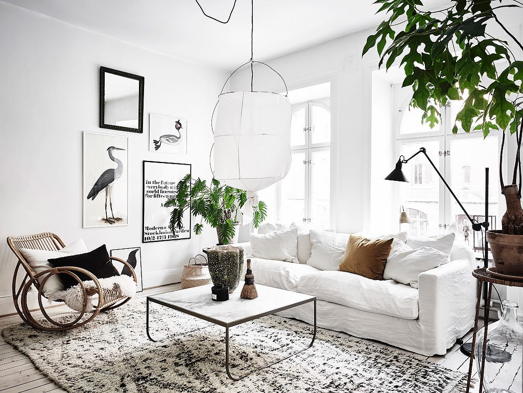 NoMad Luxuries Home Tour Scandinavian design rustic and white washed apartment and a bright living room