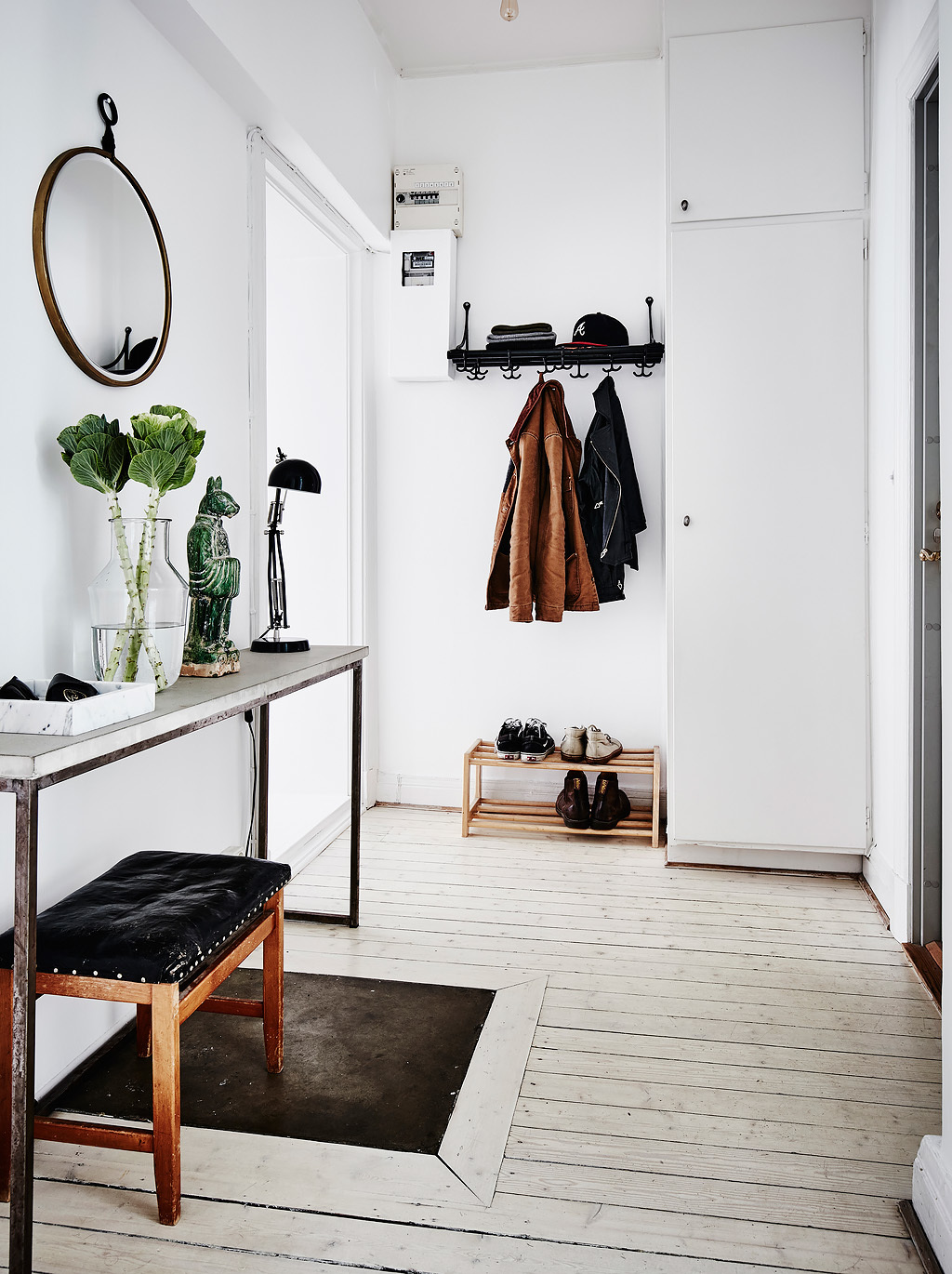 NoMad Luxuries Home Tour Scandinavian design rustic and white washed apartment and a bright entry