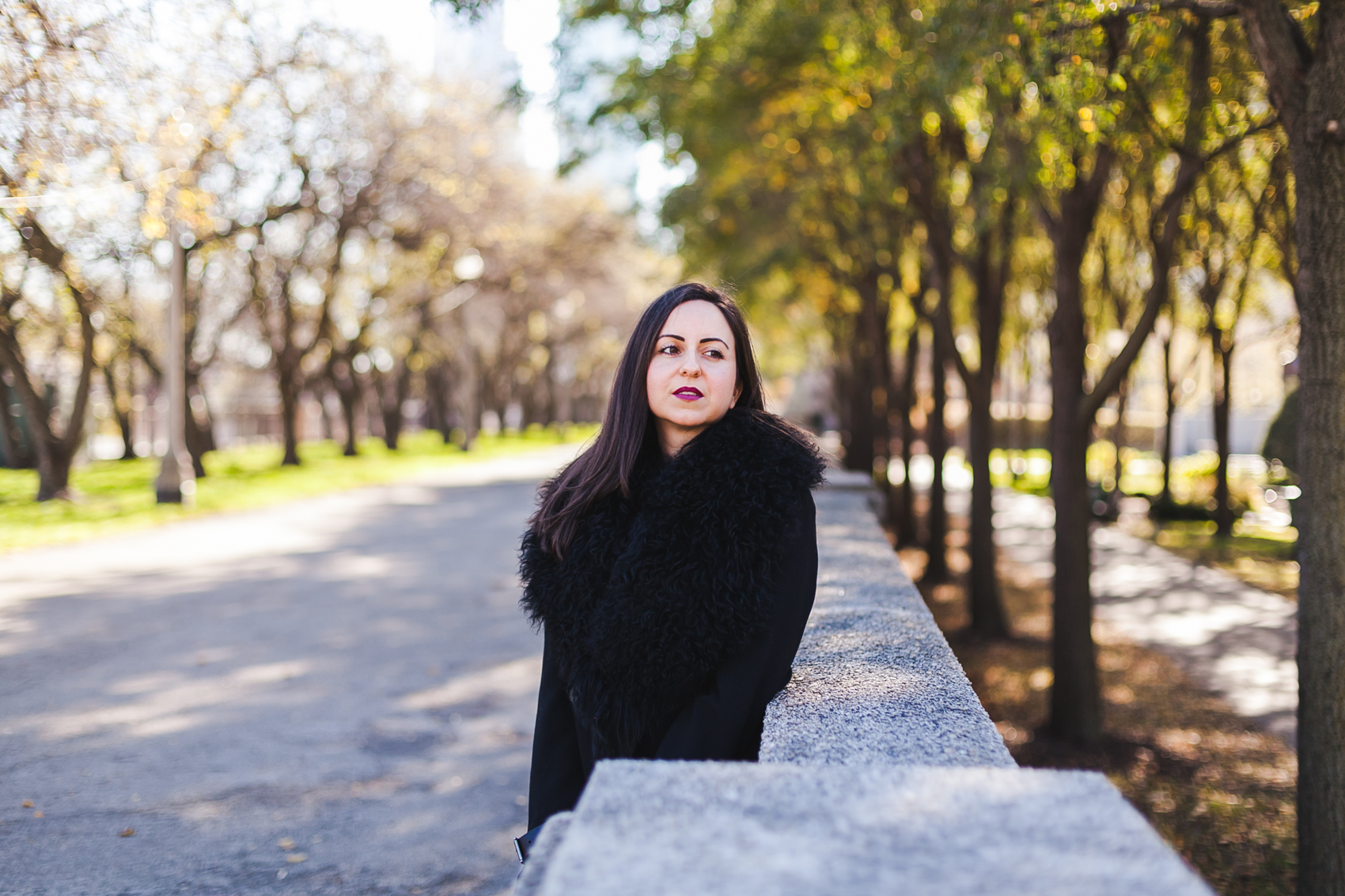 Yana Frigelis of NoMad Luxuries wearing an all black fall look in Chicago