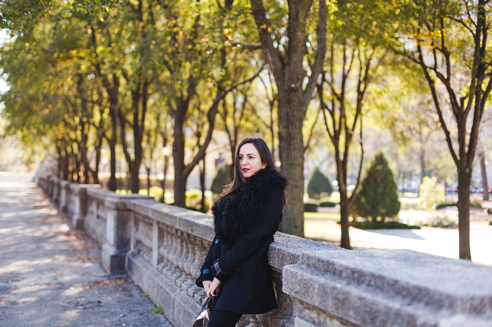 Yana Frigelis of NoMad Luxuries wearing an all black fall look in Chicago