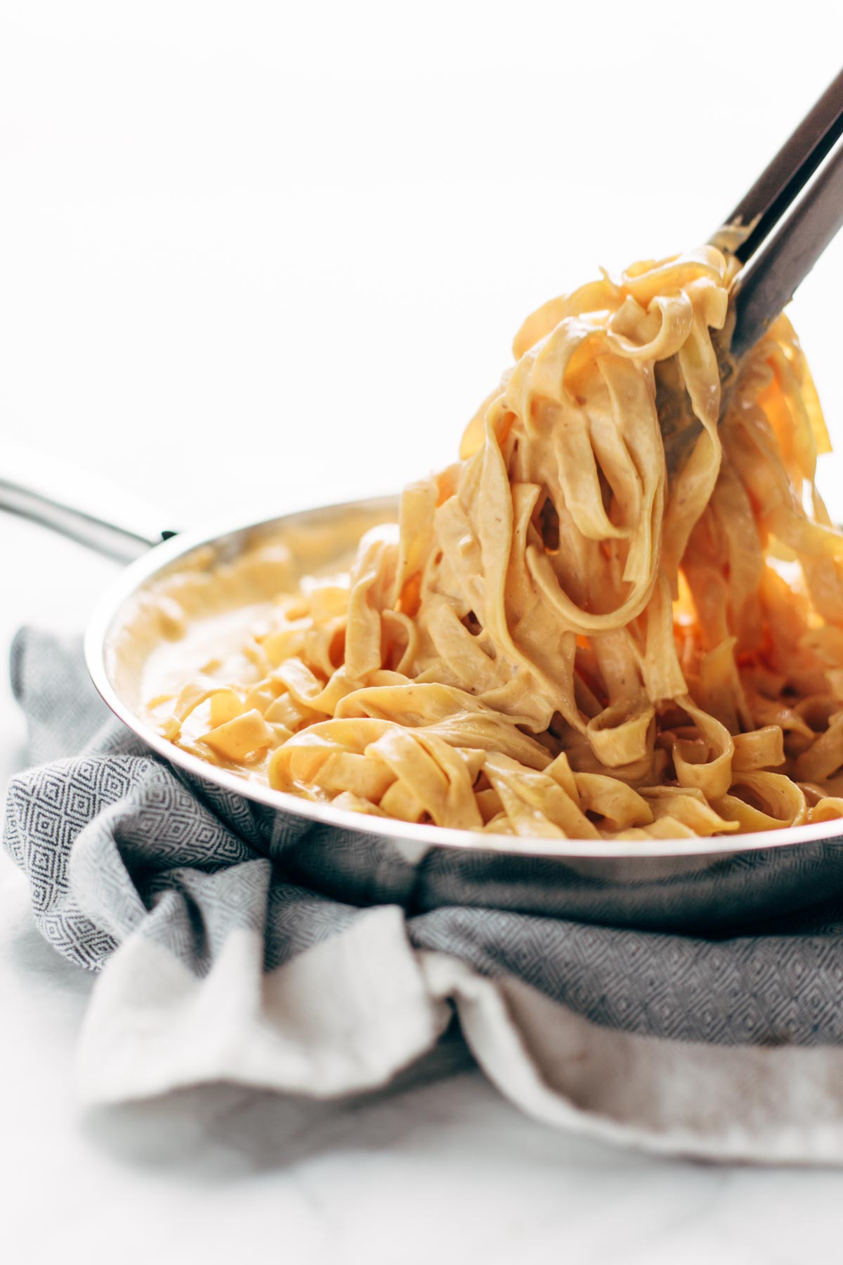 NoMad Luxuries Sunday pairings with pasta in a grey neutral kitchen for the fall