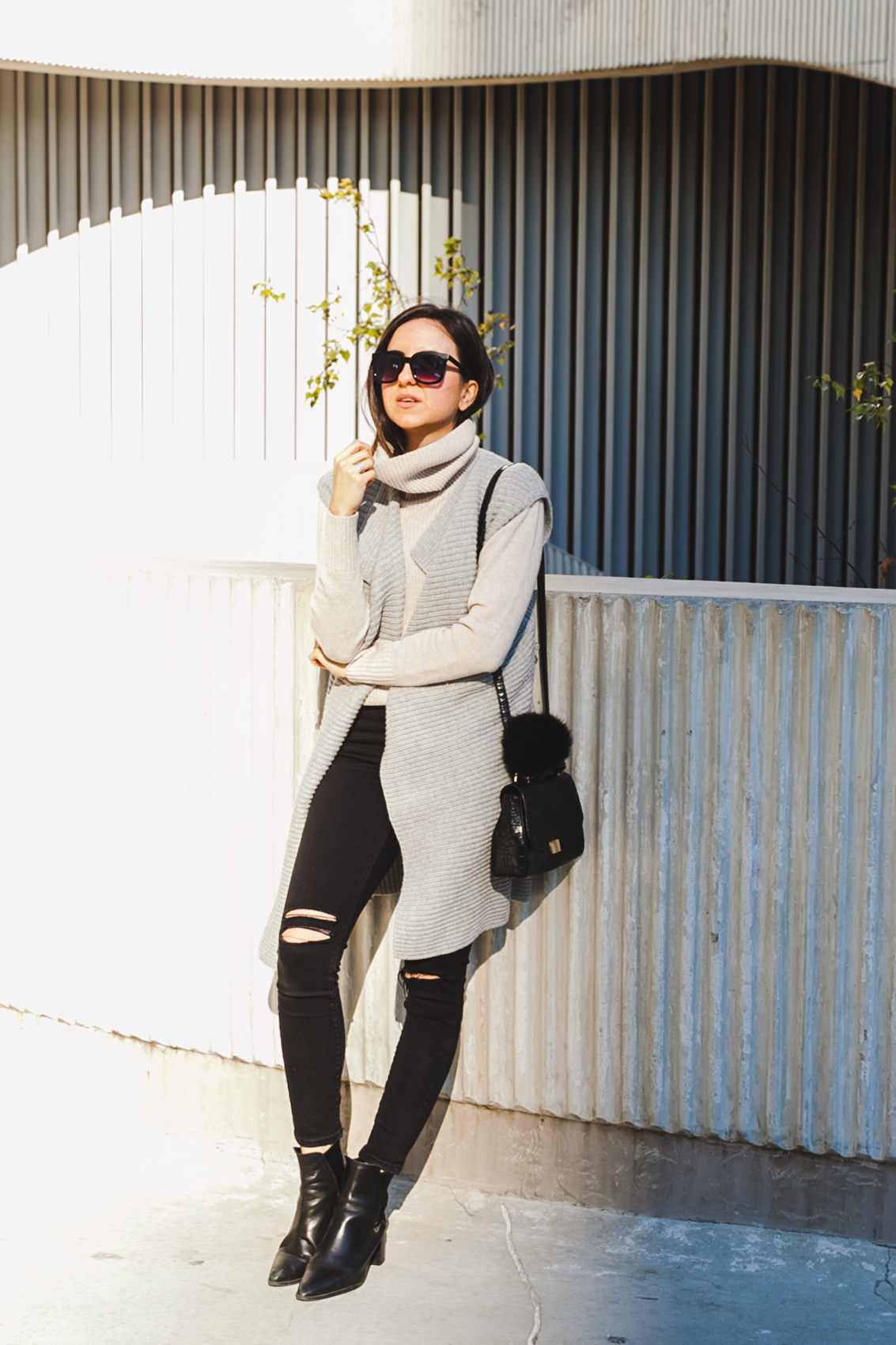 Yana Frigelis of NoMad Luxuries wearing a layered look from Banana Republic, Asos and Zara in Neutrals