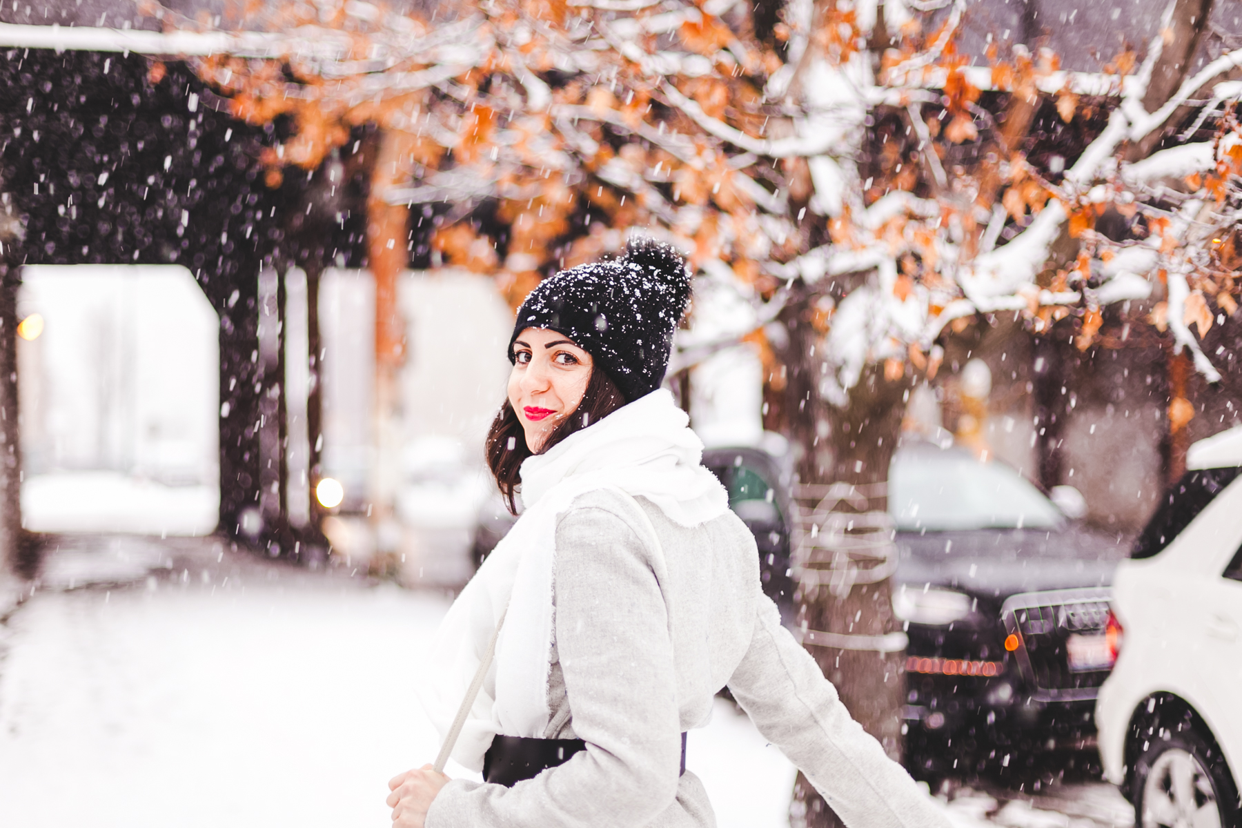 Yana Frigelis of NoMad Luxuries wearinga gray wool coat from zara for winter and new years resolutions