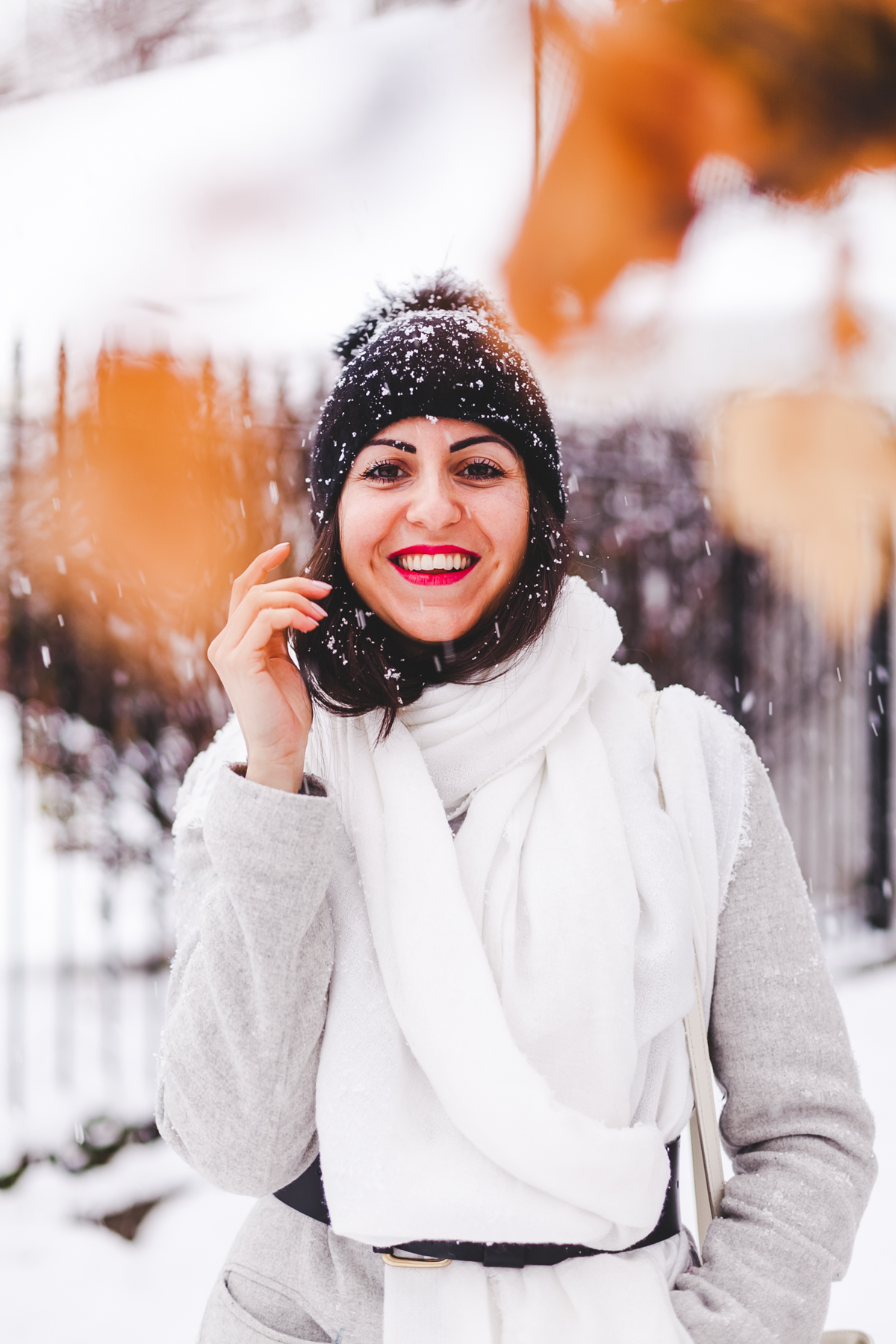 Yana Frigelis of NoMad Luxuries wearinga gray wool coat from zara for winter and new years resolutions