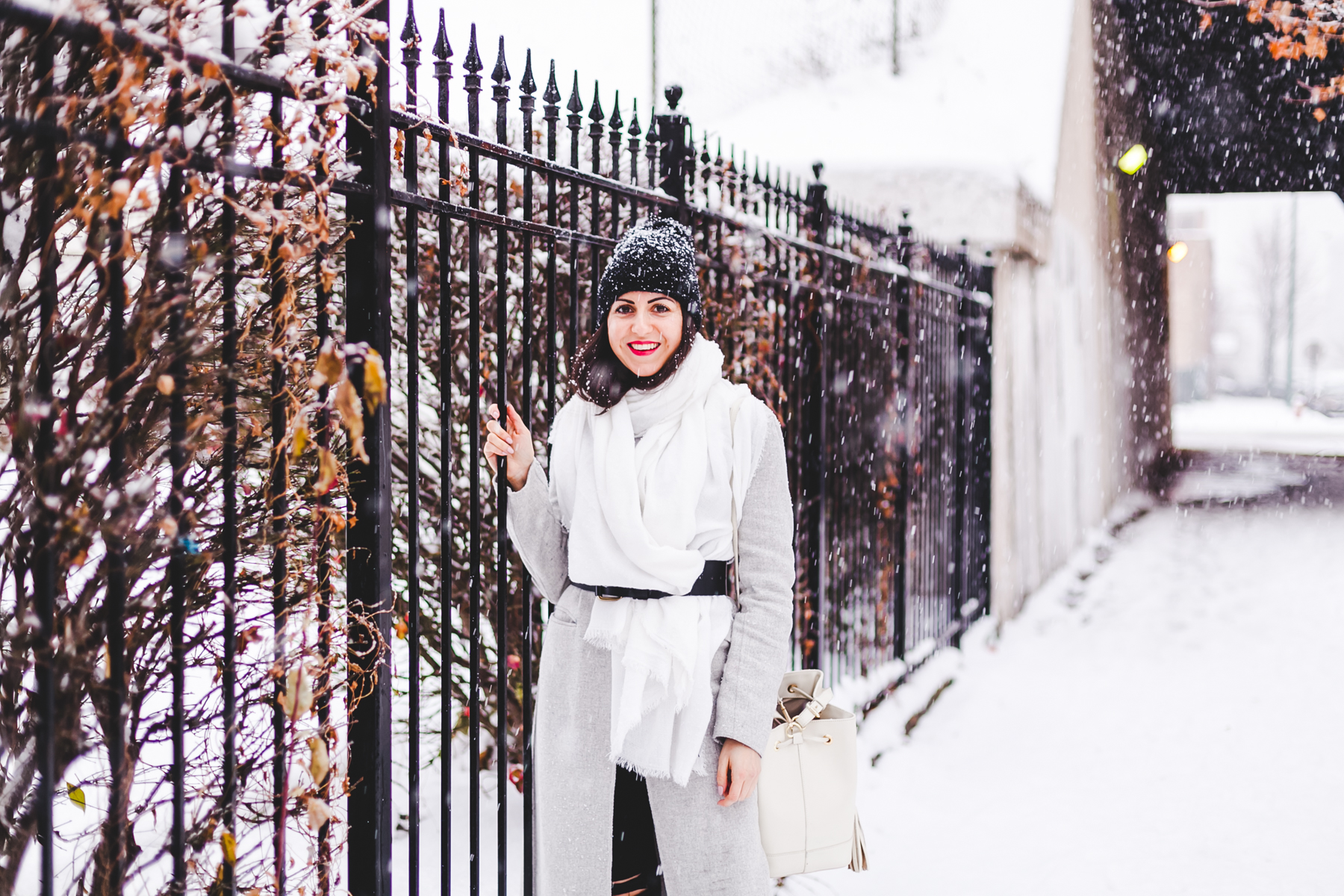 Yana Frigelis of NoMad Luxuries wearinga gray wool coat from zara for winter and new years resolutions