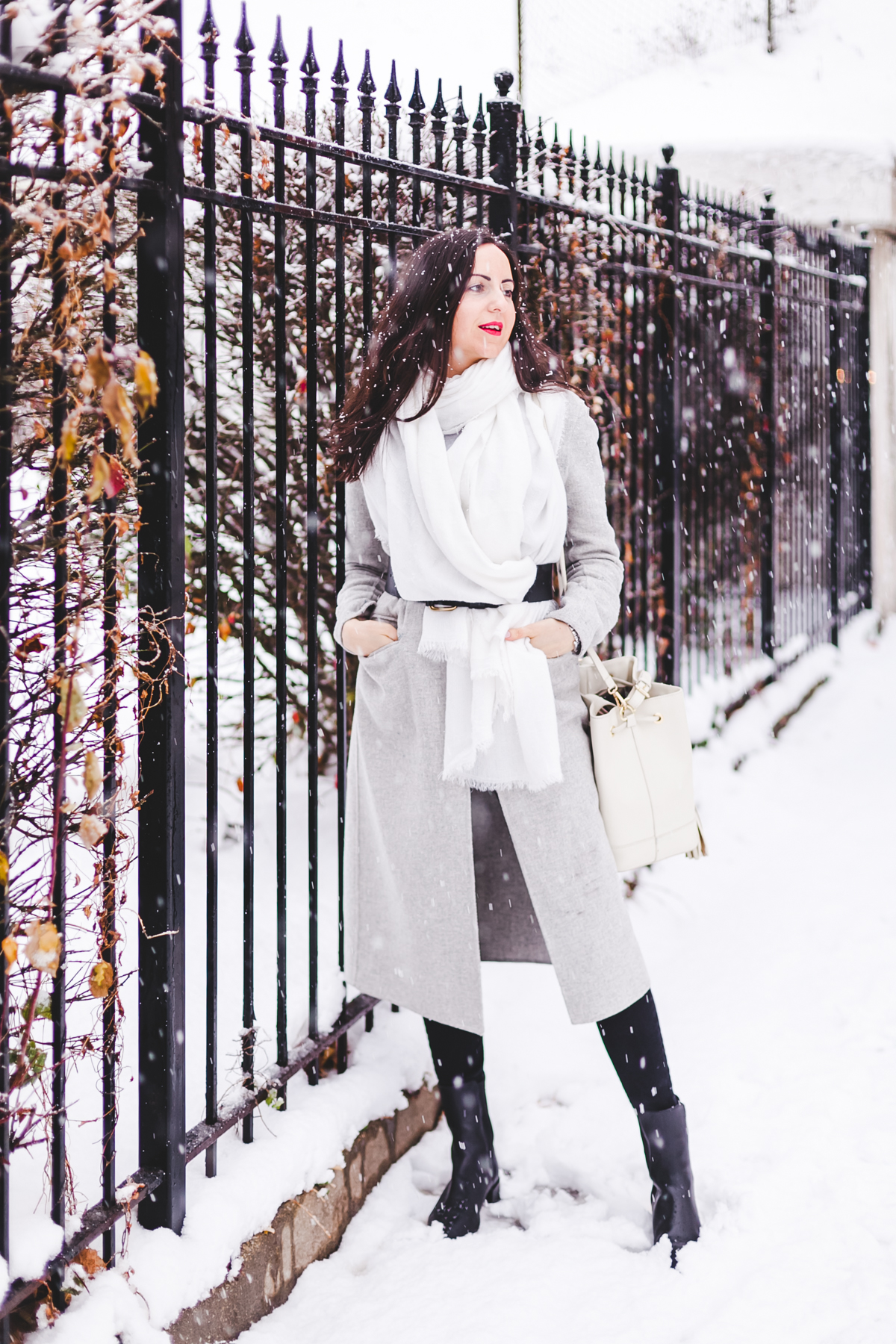 Yana Frigelis of NoMad Luxuries wearinga gray wool coat from zara for winter and new years resolutions