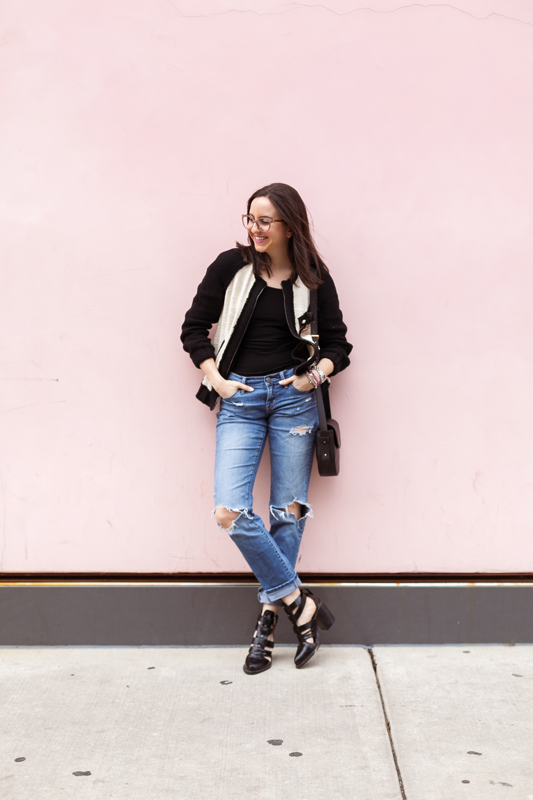 Yana of NoMad Luxuries wearing ripped jeans with a floral embroidered jacket from Zara for Spring style in Chicago