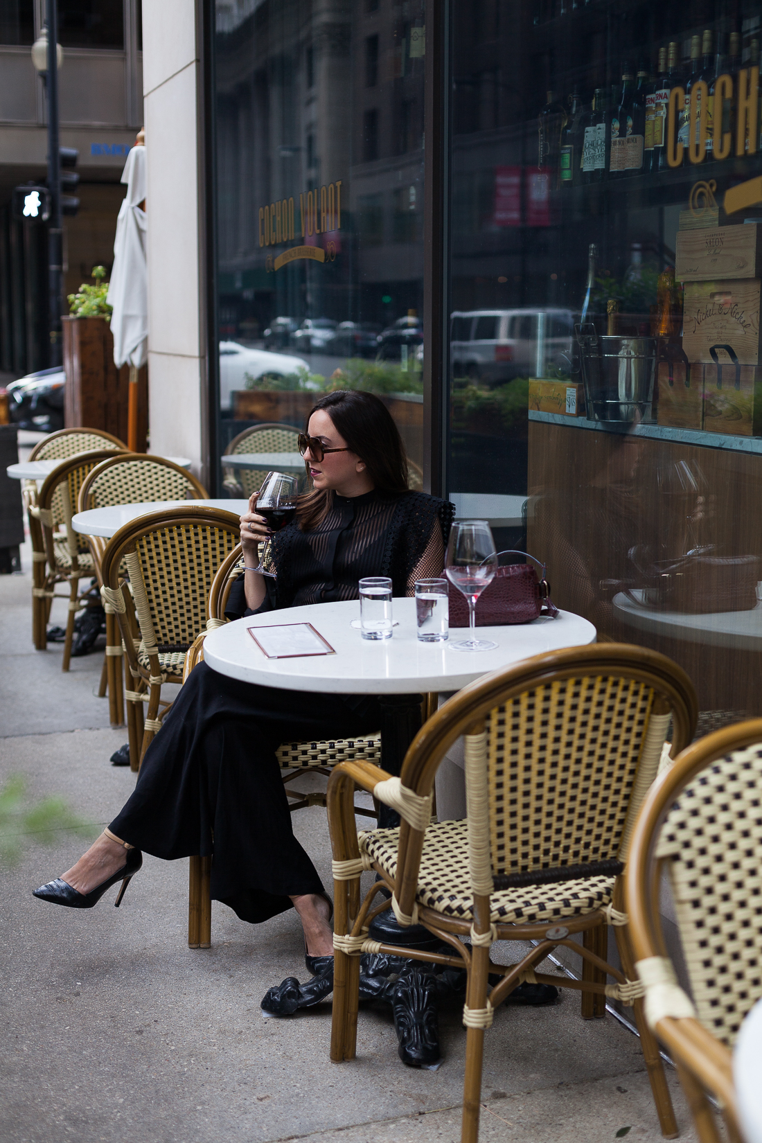 Yana Frigelis of NoMad Luxuries shares how to style a sheer, black lace top with palazzo pants for the Fall 