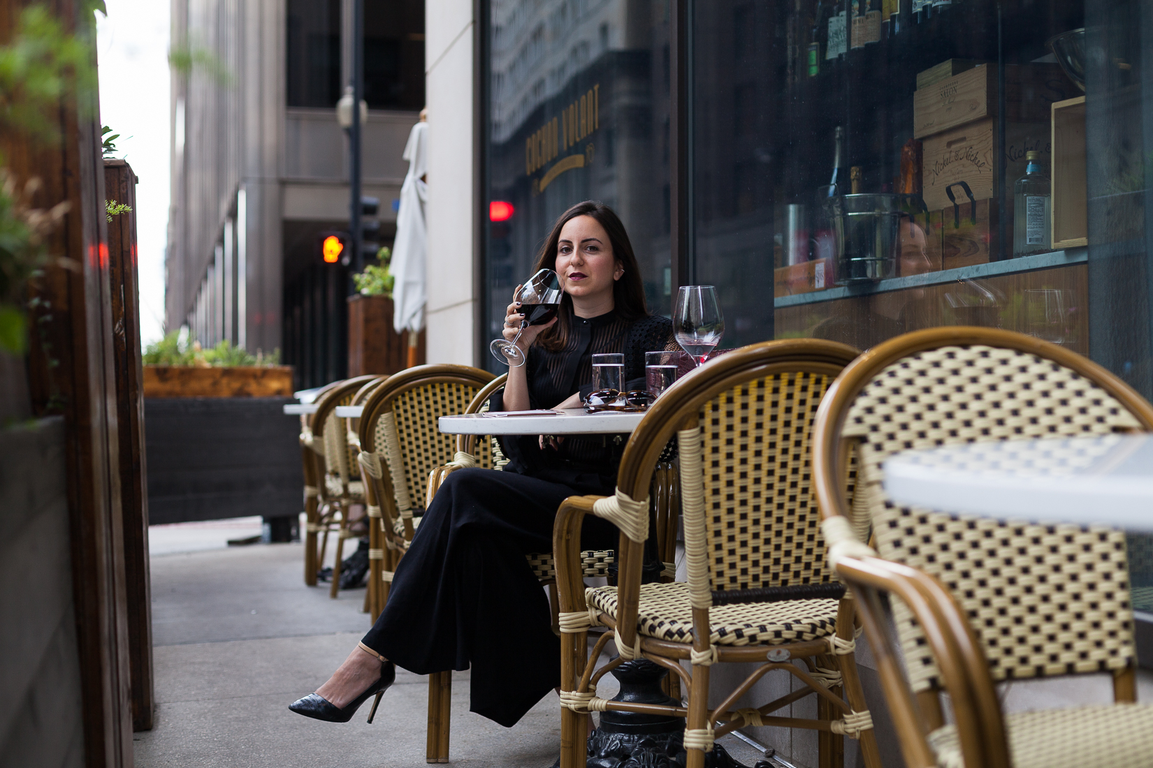 Yana Frigelis of NoMad Luxuries shares how to style a sheer, black lace top with palazzo pants for the Fall 