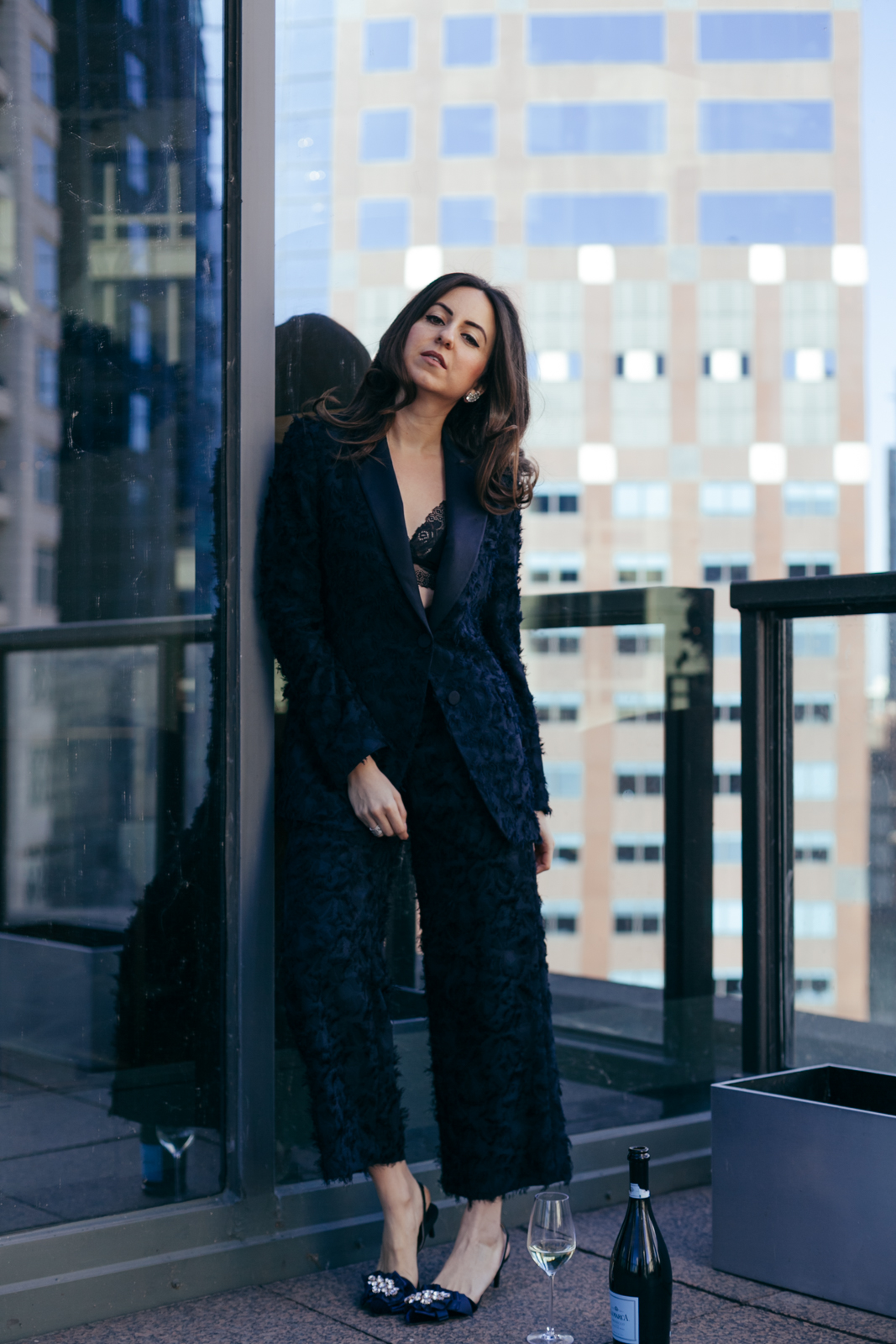 Yana Frigelis of NoMad Luxuries styles a navy blue suit for New Year's Eve Celebrations 