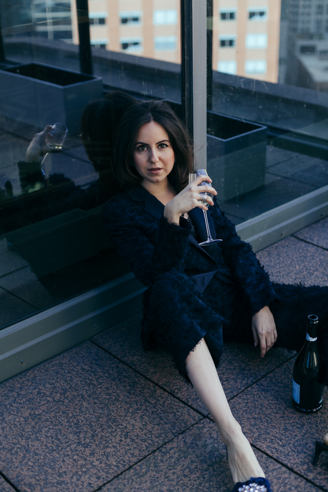 Yana Frigelis of NoMad Luxuries styles a navy blue suit for New Year's Eve Celebrations 