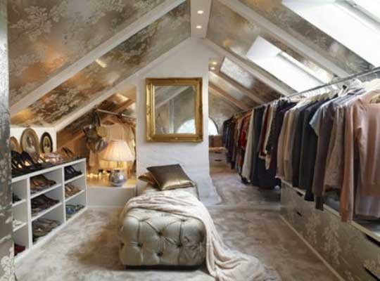Nomad Luxuries photo inspiration of luxe and dreamy attic closet decorated with accents of gold and cream. 
