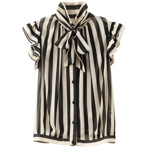 Nomad Luxuries image of tuxedo inspired blouse with black and white bow stripes. 