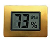 A brass hygrometer to measure the humidity within a room.