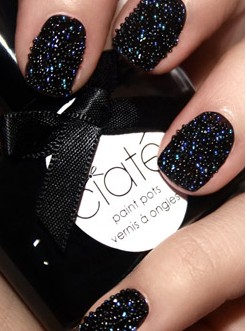Nomad luxuries photo of black caviar manicure.