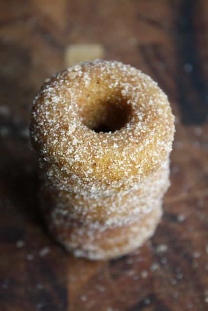 Nomad Luxuries food photography of pumpkin spiced donuts on top of one another. 