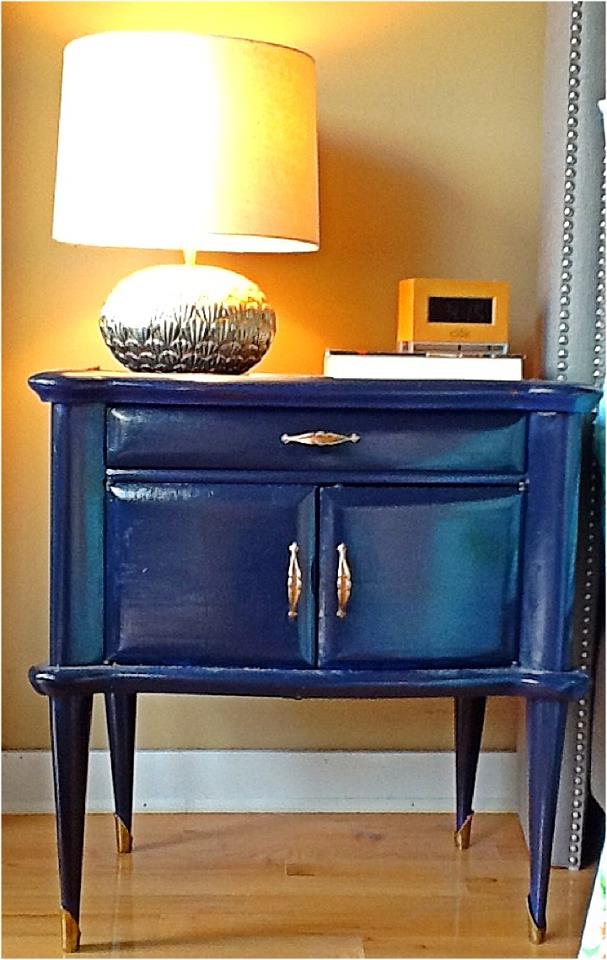 Nomad Luxuries photo of midnight blue nightstand for design inspiration. 