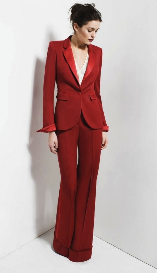 Nomad Luxuries photo of blood red tuxedo with bell bottomed pants. 
