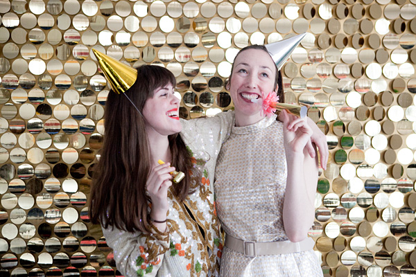 Nomad Luxuries photo of sequin themed photo booth with a fun party element. 