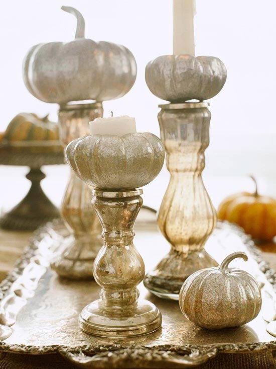 Nomad Luxuries silver pumpkin candle holders. 