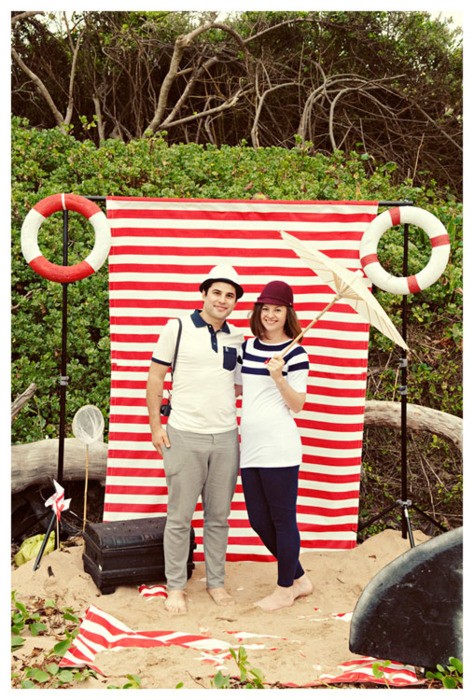 Nomad Luxuries photo of DIY striped nautical themed photo booth. 