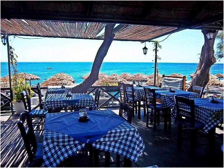 Nomad Luxuries photo capturing Beachside Tavernas seating area. 